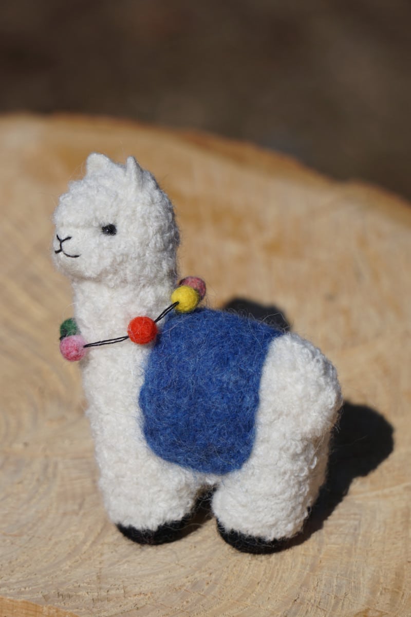 Hand felted 4 1/2 and 8 inch tall alpaca pals.