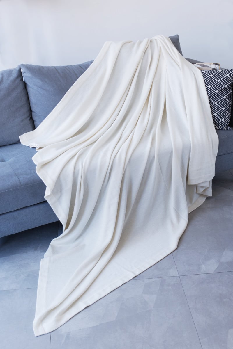 100% Pure All Natural Baby Alpaca Blanket for Full, Queen And King Size Beds. It also doubles as a cozy throw.